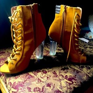 Open toed clear heel boots